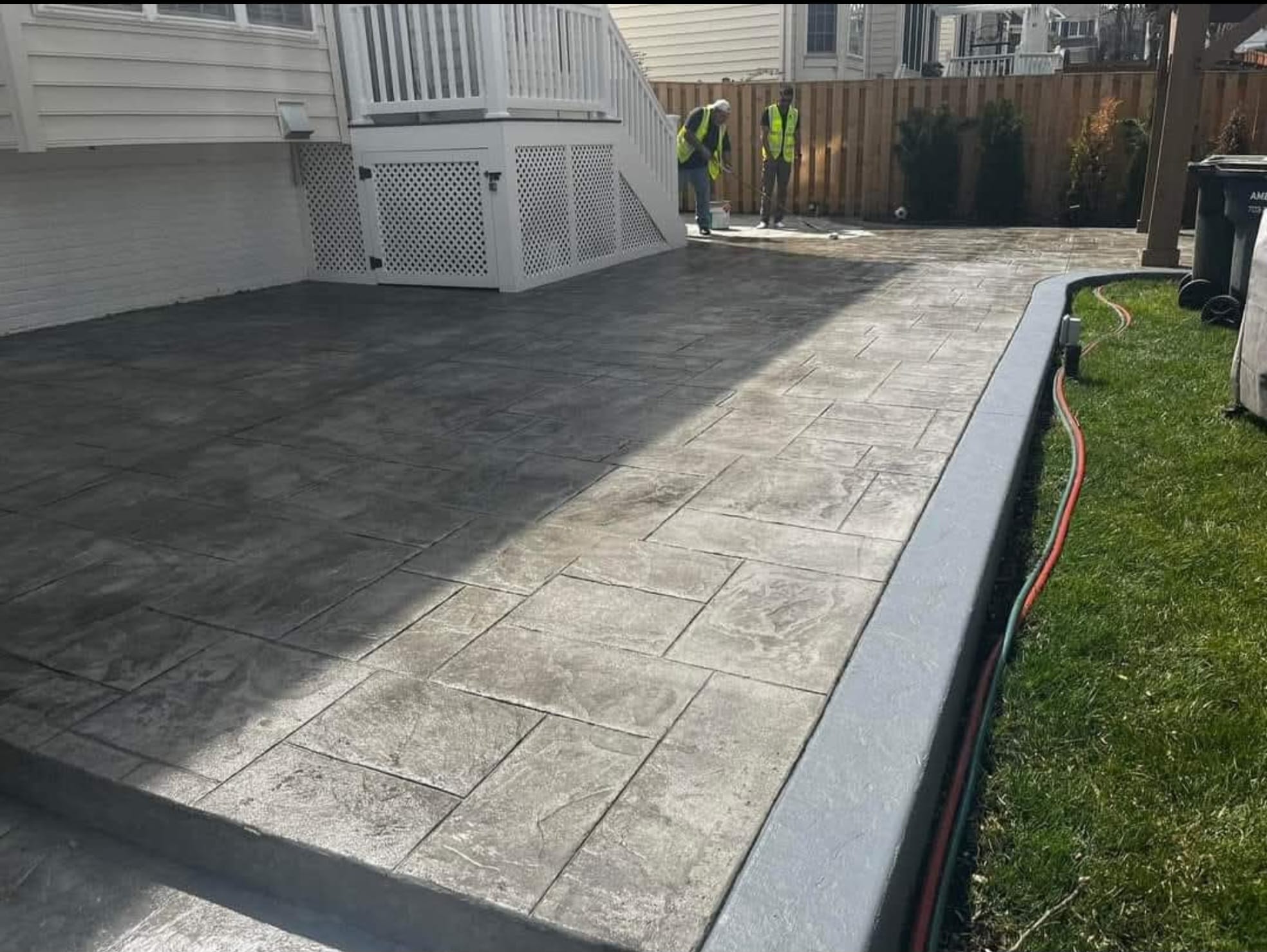 Stamped concrete patio installed in a Virginia backyard by Outdoor Design Solutions LLC